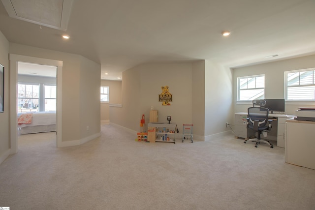 office space featuring recessed lighting, attic access, light colored carpet, and baseboards