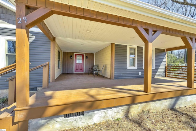 exterior space featuring crawl space and covered porch