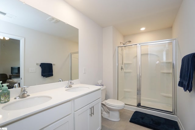 bathroom featuring a sink, visible vents, double vanity, and a shower stall