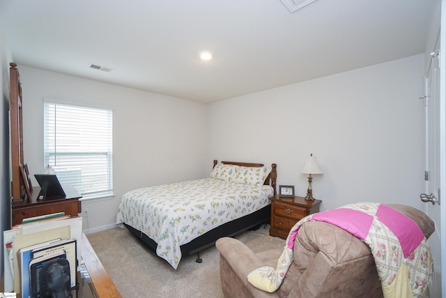 carpeted bedroom featuring recessed lighting, baseboards, and visible vents