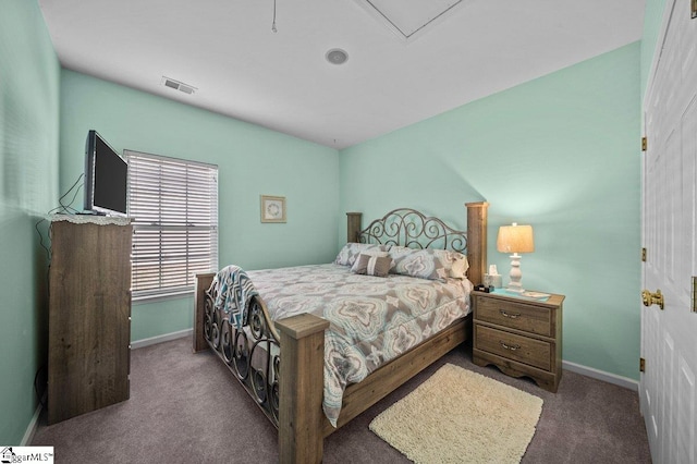 bedroom featuring visible vents, baseboards, and carpet floors