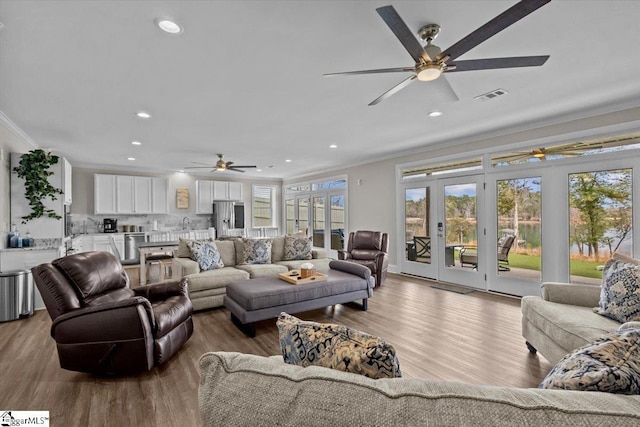 145 Brady Dr, Anderson, SC 29626 - living area with recessed lighting, visible vents, wood finished floors, and crown molding
