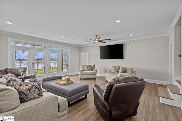 145 Brady Dr, Anderson, SC 29626 - living room featuring french doors, wood finished floors, baseboards, and ornamental molding
