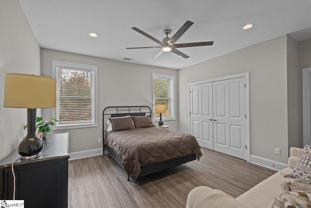 145 Brady Dr, Anderson, SC 29626 - bedroom with multiple windows, wood finished floors, visible vents, and baseboards