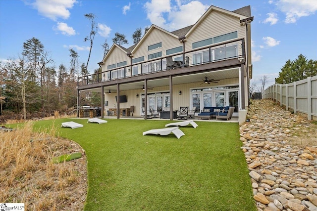 145 Brady Dr, Anderson, SC 29626 - rear view of house featuring a lawn, a patio, fence, french doors, and a balcony