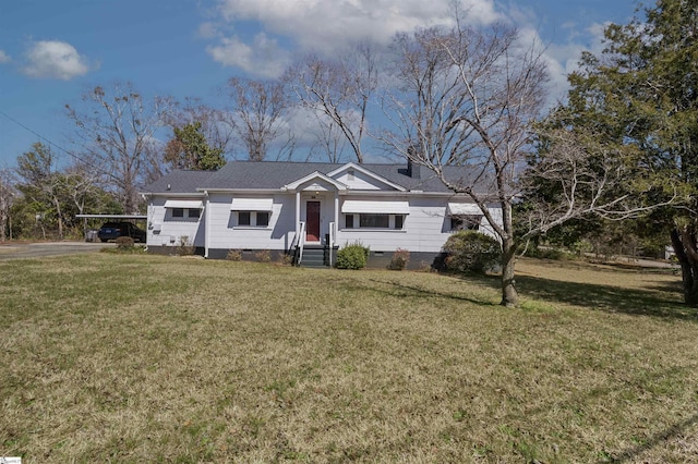 ranch-style house featuring an attached carport, a front lawn, and crawl space