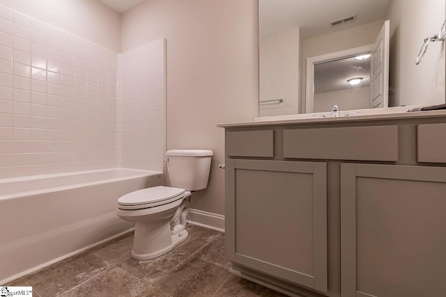 bathroom featuring visible vents, baseboards, toilet, bathtub / shower combination, and vanity