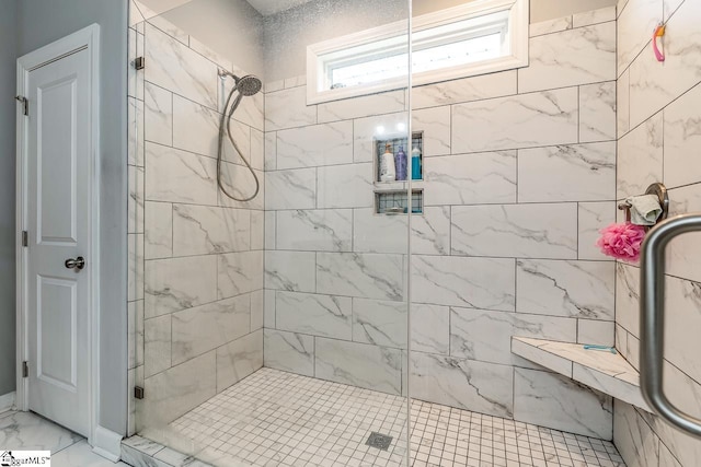 full bathroom with a shower stall