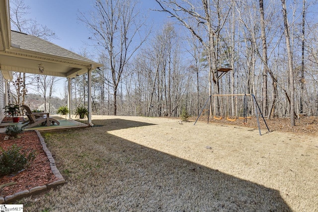 view of yard featuring playground community