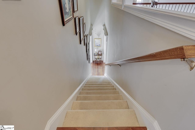 staircase with baseboards