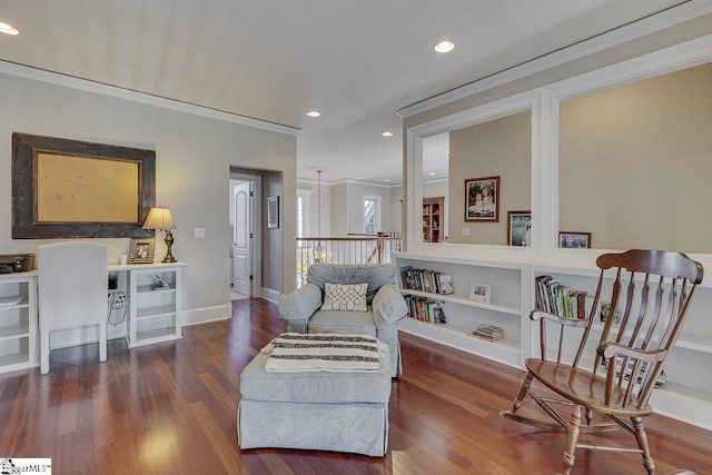 sitting room featuring recessed lighting, crown molding, baseboards, and wood finished floors