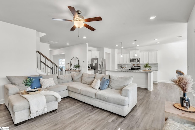 504 Reedy Springs Ln, Greenville, SC 29605 - living area featuring stairs, recessed lighting, light wood-style floors, and baseboards