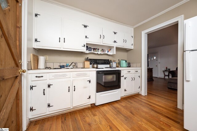 kitchen with white appliances, white cabinetry, light wood-type flooring, and ornamental molding