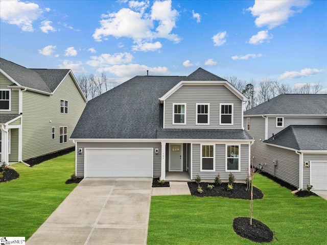 traditional-style house featuring a front lawn, concrete driveway, a garage, and a shingled roof