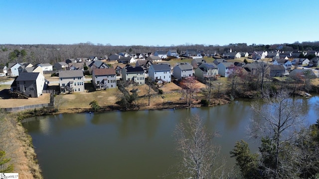 bird's eye view with a residential view and a water view