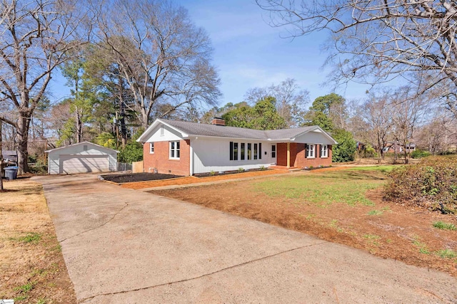 single story home featuring a front lawn, brick siding, an outdoor structure, and a chimney