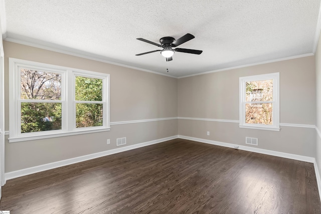 unfurnished room featuring visible vents, baseboards, a textured ceiling, and dark wood finished floors