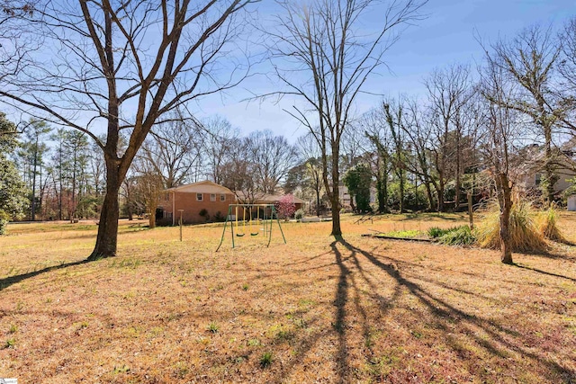 view of yard with a playground