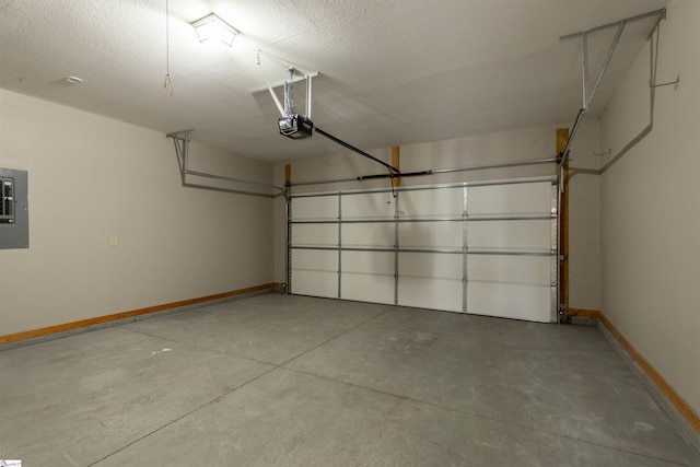 garage featuring electric panel, a garage door opener, and baseboards