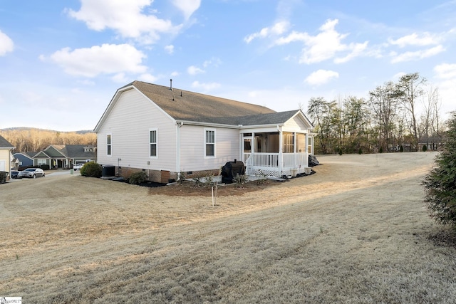 exterior space featuring cooling unit and crawl space