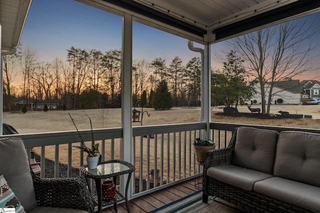 deck at dusk with a porch