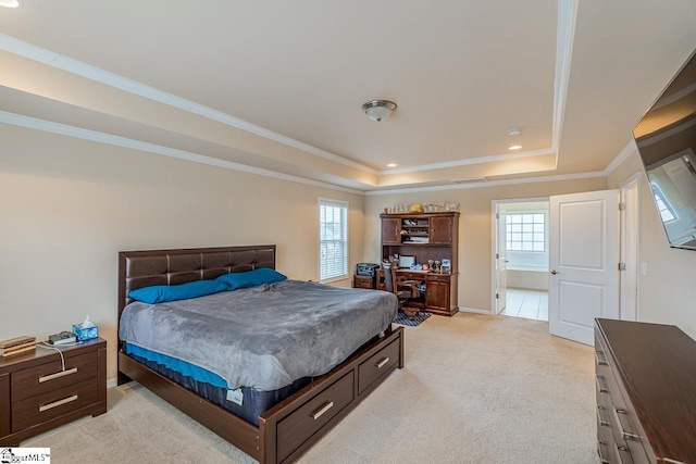 bedroom with baseboards, light colored carpet, ornamental molding, recessed lighting, and a raised ceiling