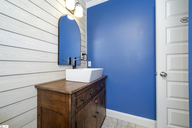 bathroom featuring vanity and baseboards