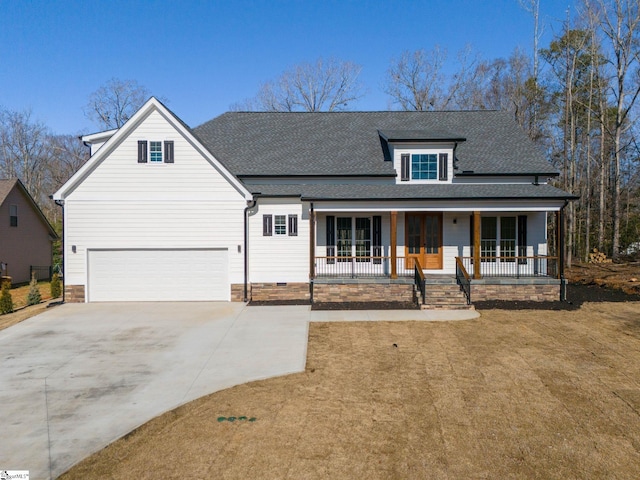 modern farmhouse style home with a porch, concrete driveway, a garage, and a shingled roof