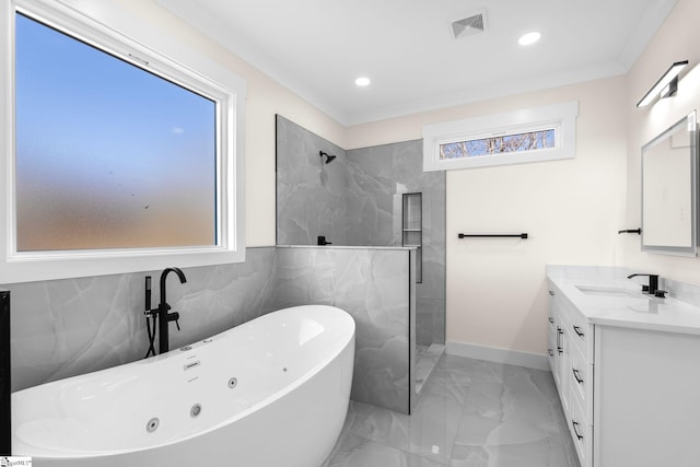 full bath with visible vents, marble finish floor, a walk in shower, a soaking tub, and vanity