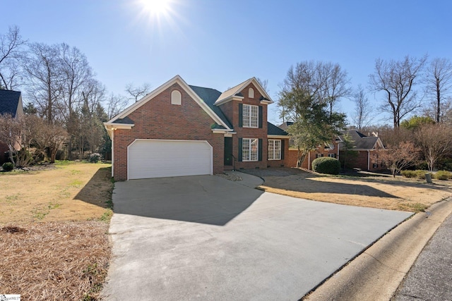 traditional home featuring a garage, brick siding, concrete driveway, and a front lawn