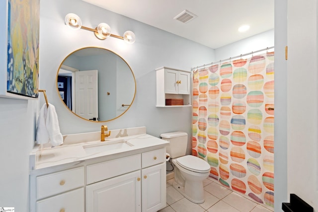 full bath featuring vanity, a shower with shower curtain, visible vents, tile patterned flooring, and toilet