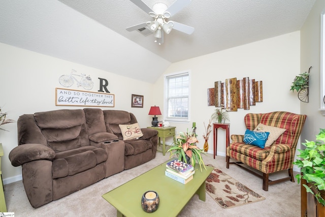 carpeted living area featuring visible vents, baseboards, vaulted ceiling, a textured ceiling, and a ceiling fan