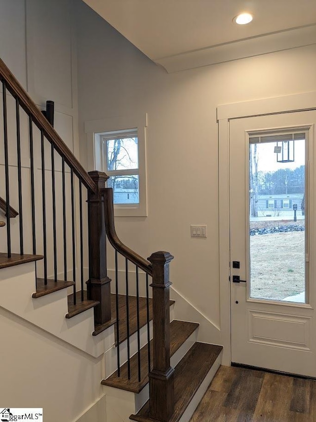 entrance foyer with stairway, recessed lighting, and dark wood-style flooring