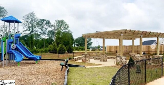 community play area featuring a pergola and fence