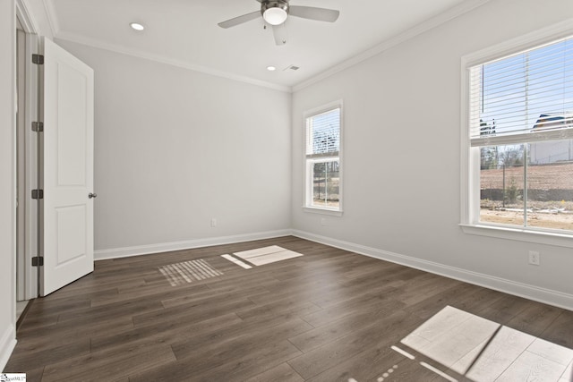 unfurnished room with ceiling fan, baseboards, crown molding, and dark wood-type flooring