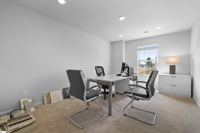 office area with visible vents, recessed lighting, light colored carpet, and baseboards