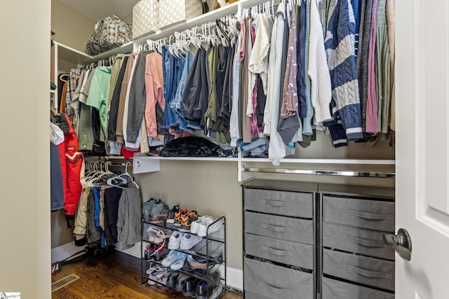 spacious closet with visible vents and wood finished floors