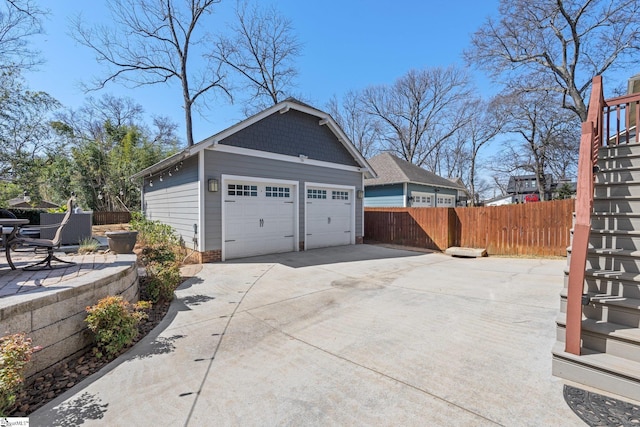 garage with fence