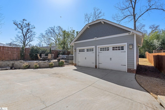 detached garage with fence