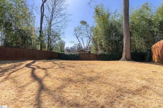 view of yard featuring fence