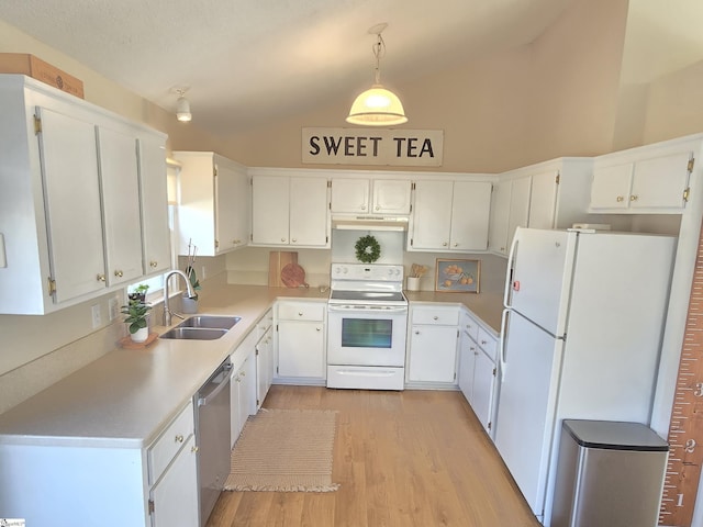 kitchen featuring light wood-type flooring, a sink, white appliances, white cabinets, and light countertops