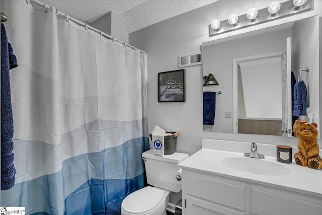 bathroom with visible vents, a shower with curtain, toilet, a textured ceiling, and vanity