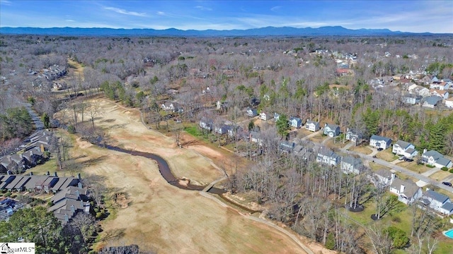 birds eye view of property with a mountain view and a residential view