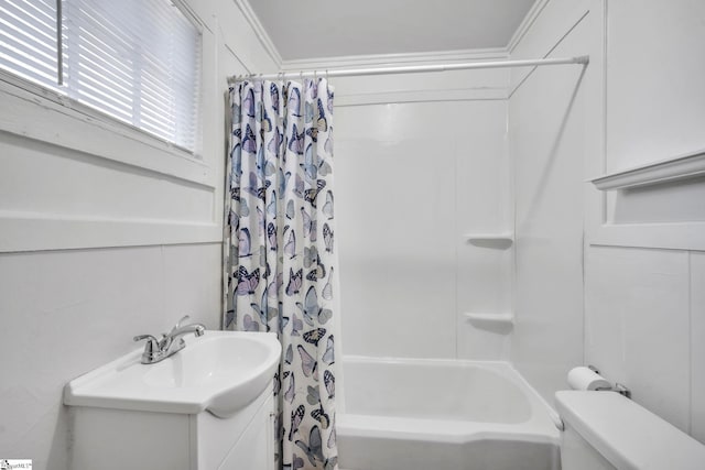 bathroom featuring vanity, shower / bath combination with curtain, and toilet