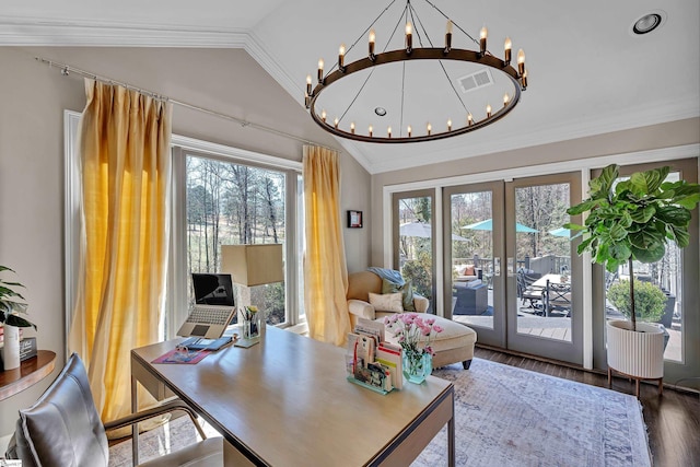 office with wood finished floors, visible vents, vaulted ceiling, french doors, and crown molding