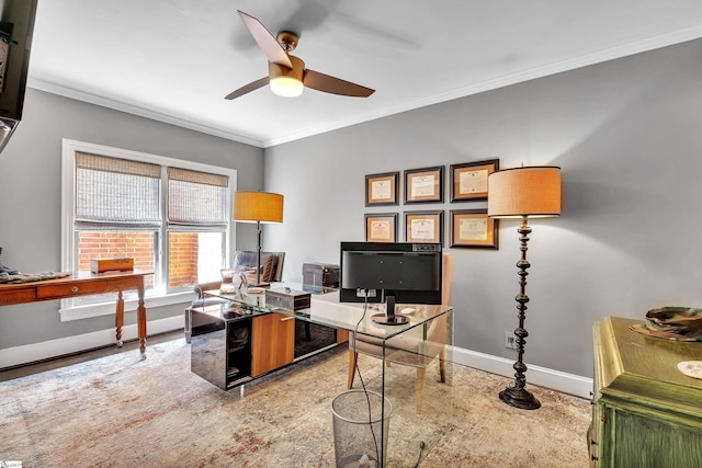 office space with ceiling fan, baseboards, and ornamental molding