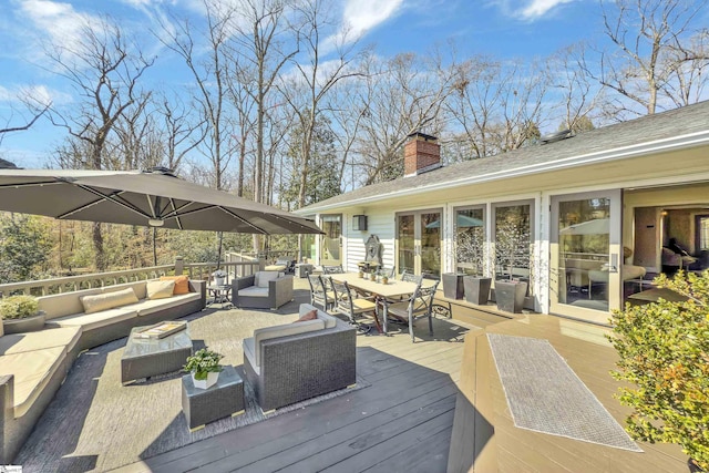 wooden deck featuring an outdoor hangout area