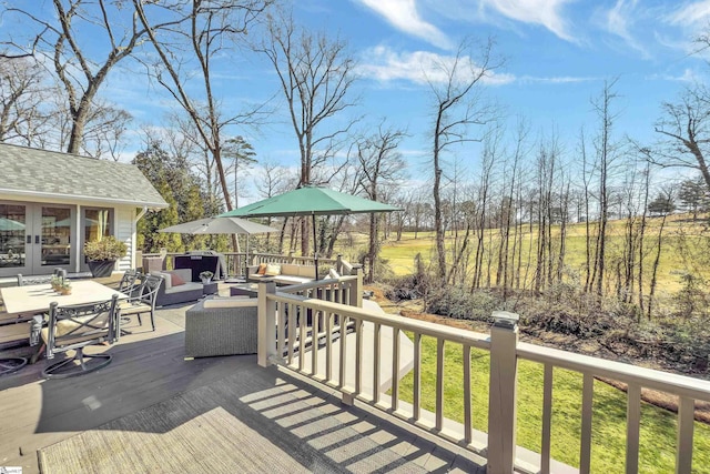 deck featuring outdoor lounge area, outdoor dining space, french doors, and a lawn