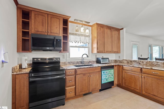 kitchen featuring electric range, a sink, open shelves, light stone counters, and dishwashing machine