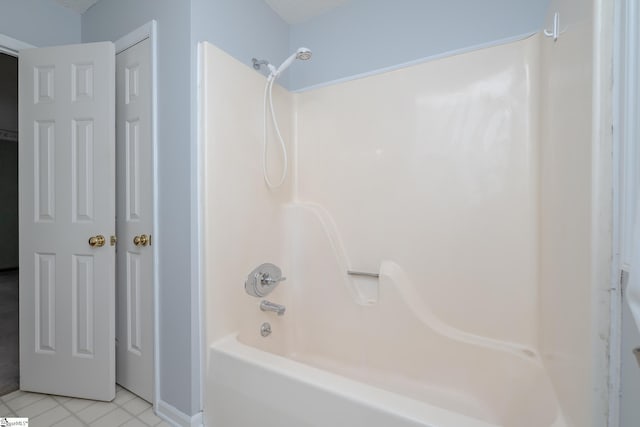 bathroom with shower / bathtub combination and tile patterned flooring